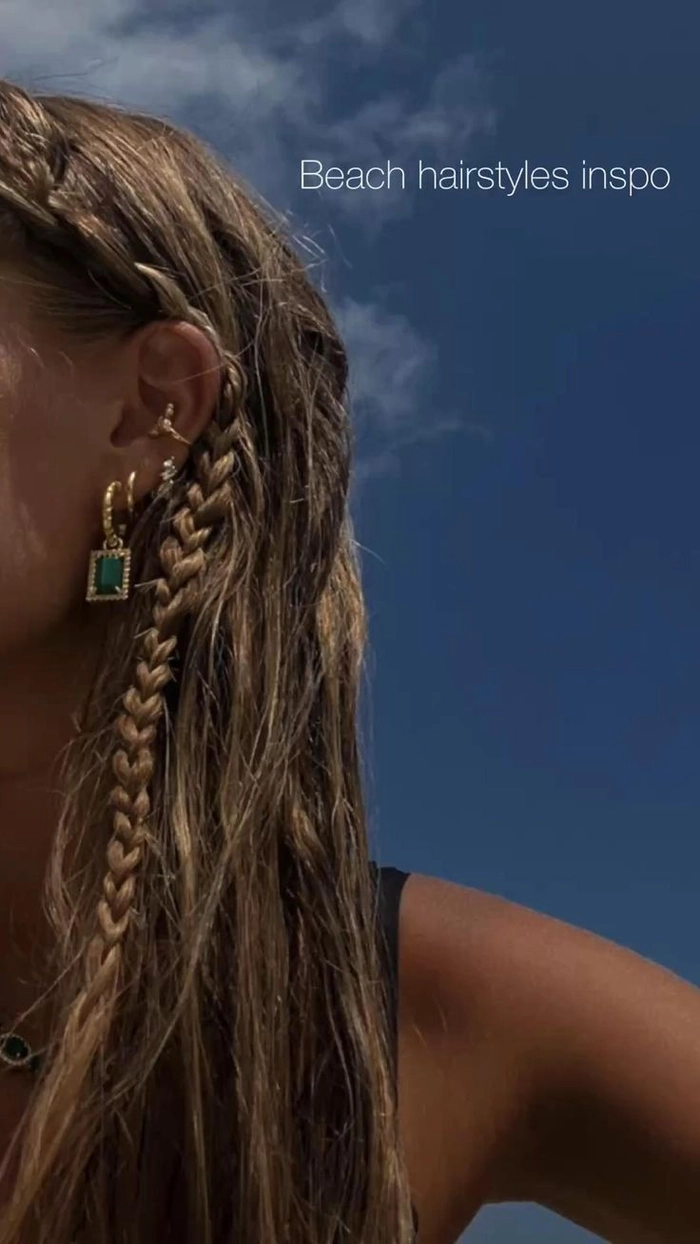 Beach festival hairstyle with braided crown and seashell accents