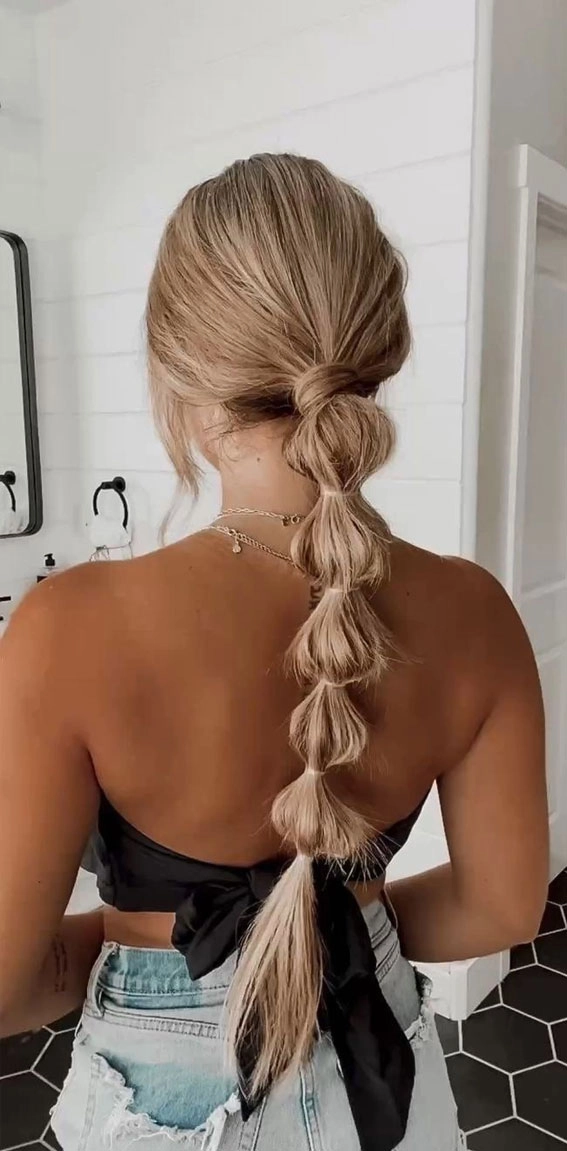 Stylish beach festival hairstyles with braids and flowers for a summer look