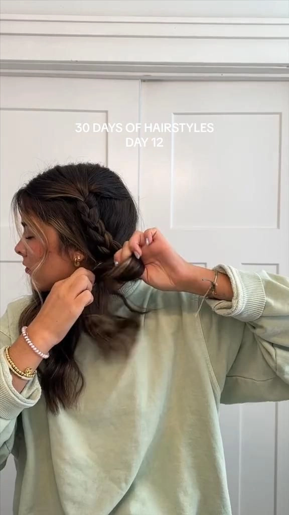 Camping festival hairstyle with braided crown and daisy accents