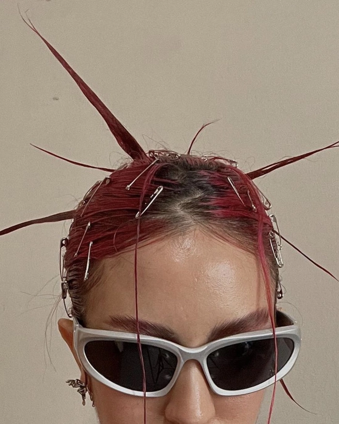 Cyberpunk Festival Hairstyle 7 - Neon Streaks and Metallic Accents Edgy cyberpunk festival hairstyles with neon highlights and futuristic braids