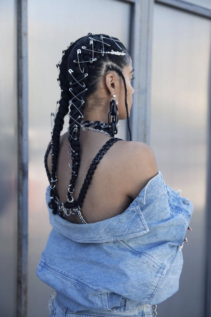 Edgy festival hairstyle with shaved sides and neon pink tips