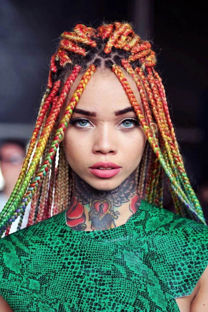 Boho braided hairstyle with bead embellishments for festival season Festival hairstyle with braided sections and decorative beads