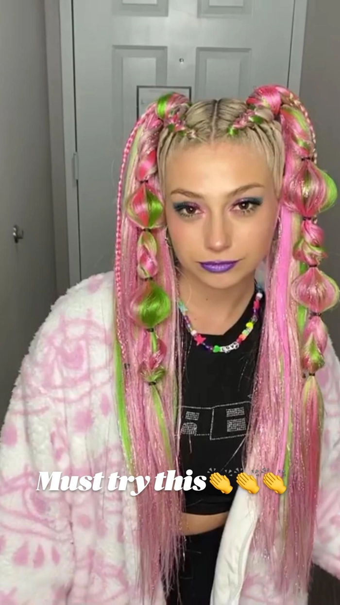 Festival bubble braid hairstyle with colorful accessories for a lively event look