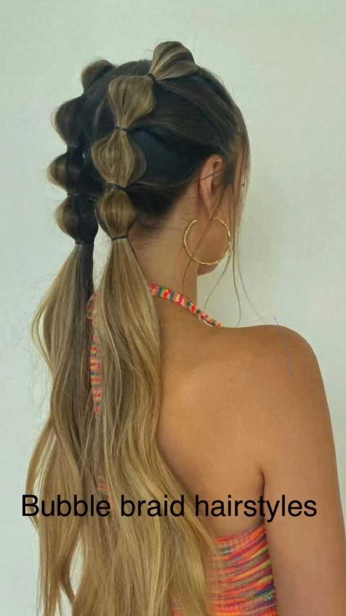 Festival bubble braid hairstyle with colorful ribbon accents