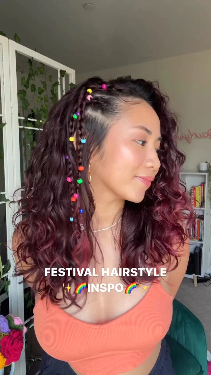 Stylish festival bun with braided details and floral accents