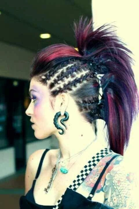 Festival Faux Hawk Hairstyle Inspiration for Your Next Concert Woman with edgy festival faux hawk hairstyle and bold makeup
