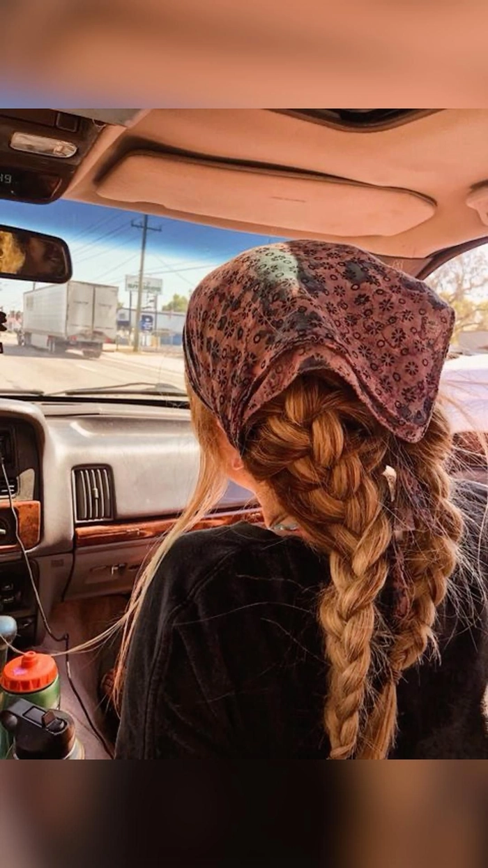 Stylish festival French braid hairstyle with colorful accessories