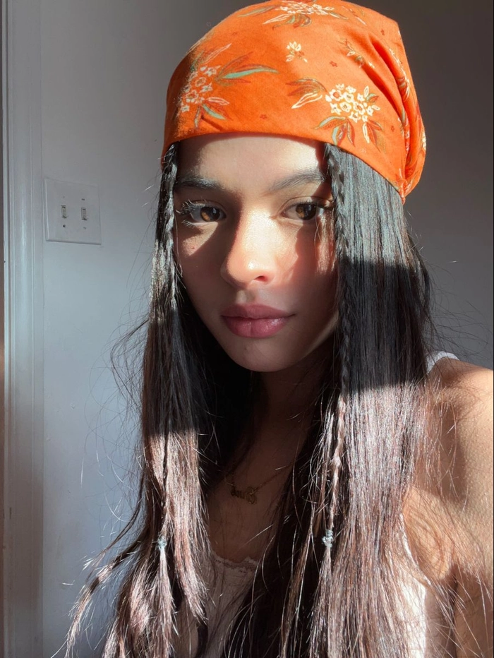 Boho festival hairstyle featuring a colorful patterned bandana Festival hairstyles with bandanas for a vibrant boho look