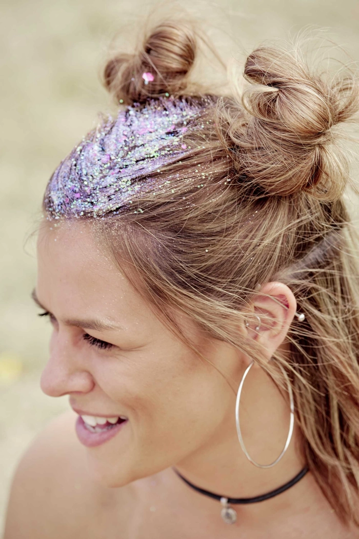 Festival Hairstyles for Teens - Braided Updo with Floral Accents Teenager with braided festival hairstyle and daisy flower crown