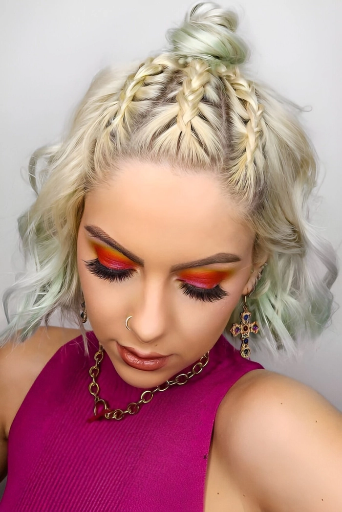Elegant updo for fine hair at a music festival Festival hairstyle for thin hair featuring delicate braids and floral accents