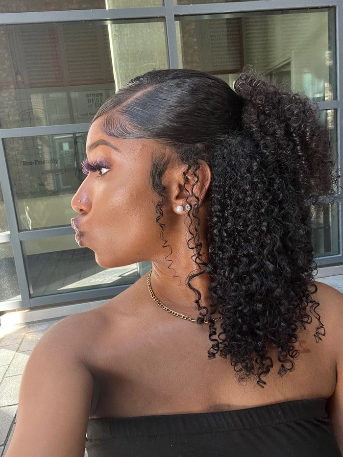 Festival-ready braided updo with bead embellishments for natural black hair Woman with intricate braided updo decorated with colorful beads and flowers, perfect for festival season