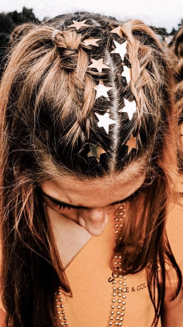Older woman with elegant festival hairstyle featuring braided updo and floral accessories