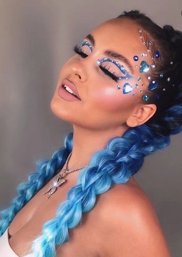 Boho festival hairstyle with ombre hair and a floral headpiece for summer events Festival hairstyle with ombre hair and braided details for a boho music festival look