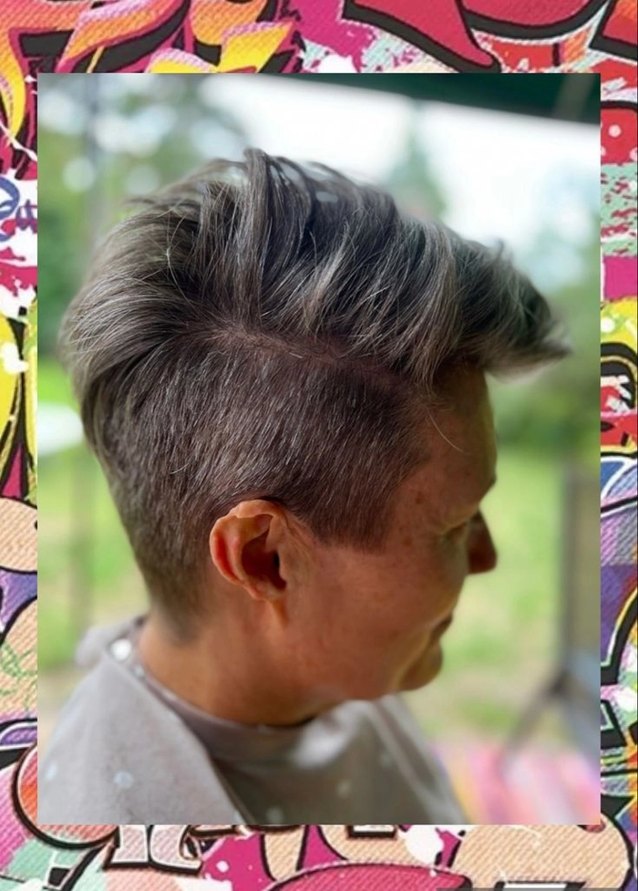 Festival Pixie Cut Hairstyle with Colorful Accessories Festival hairstyle for pixie cuts with colorful temporary dye and glitter accents