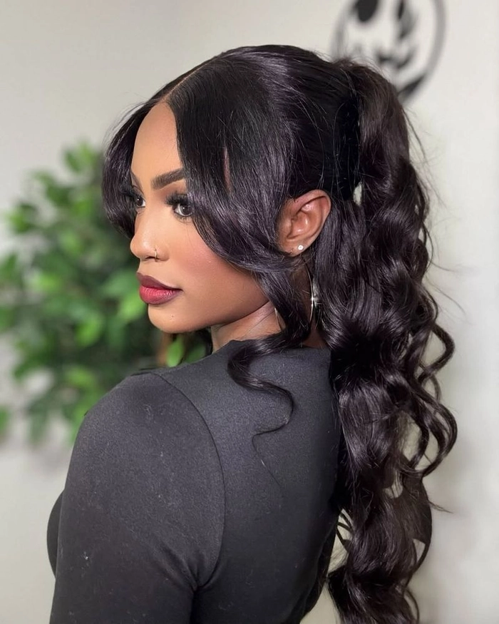 Festival Hairstyle #8 featuring soft curtain bangs and braided accents Trendy festival hairstyle with curtain bangs and bohemian waves for summer music events
