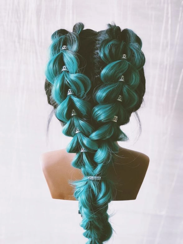 Boho festival look with long wavy clip-in extensions Festival hairstyles with extensions in a half-up braided crown