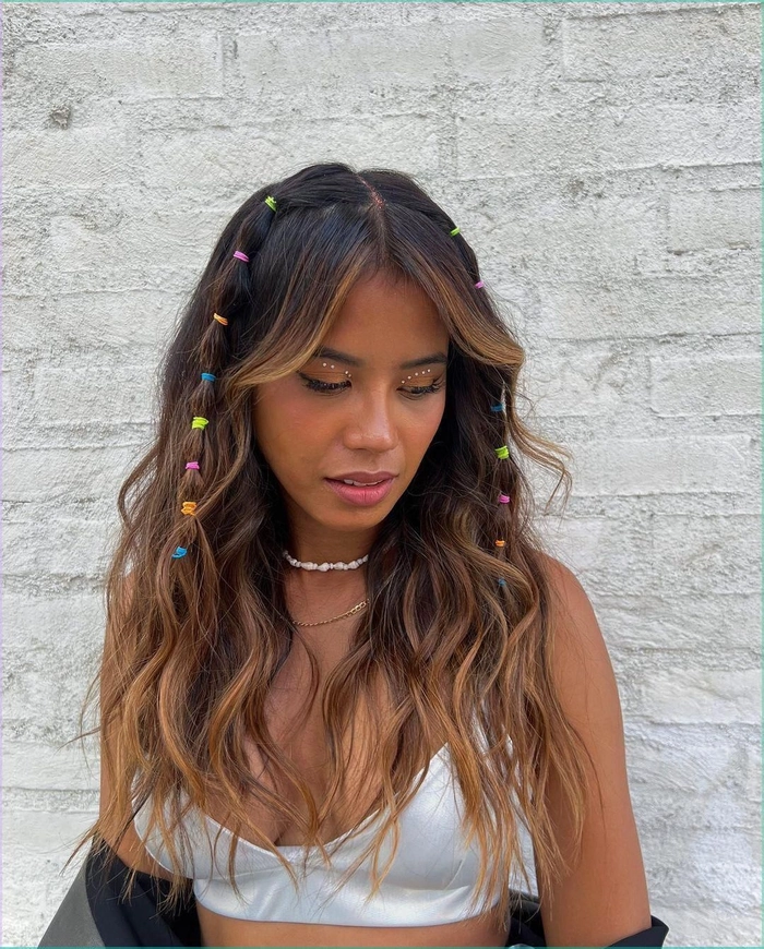 Festival hairstyles with highlights in braided and wavy styles