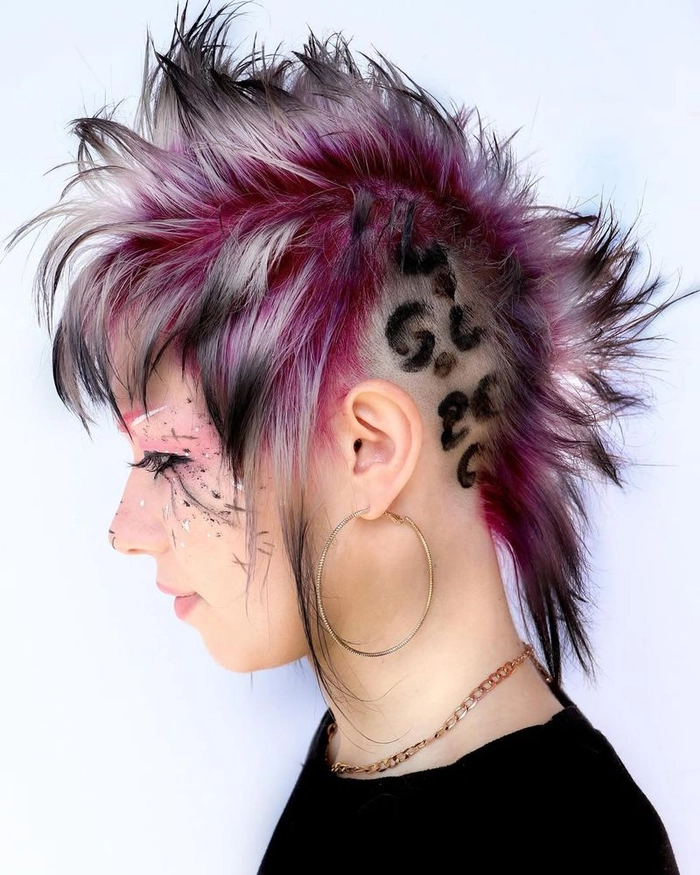 Bold and edgy festival mohawk hairstyle inspired by music events Festival mohawk hairstyle with vibrant spikes and braided sides