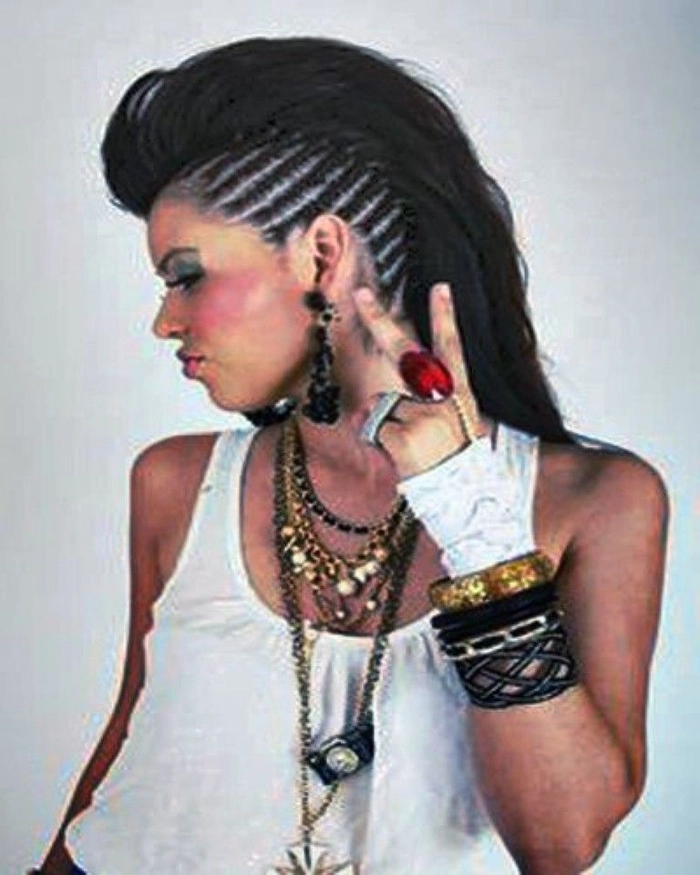 Edgy festival mohawk hairstyle featuring teased spikes and bold dye Festival mohawk hairstyle with vibrant colors and spiked texture