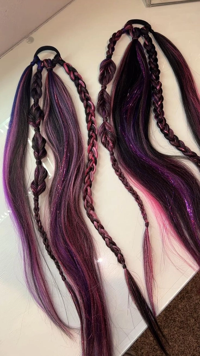 Festival pigtail hairstyles with bright ribbons and braids