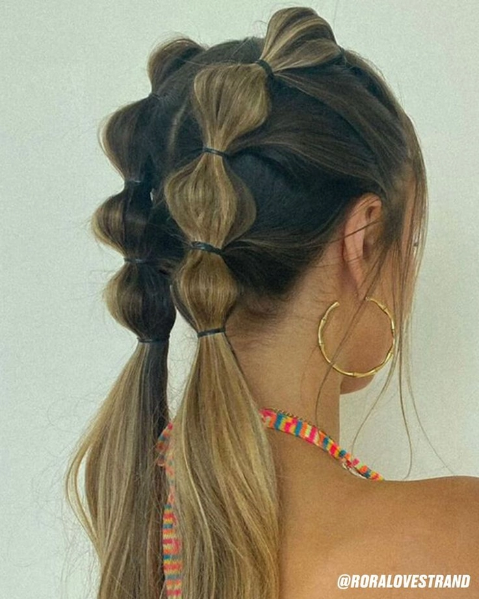 Festival pigtail hairstyles with colorful hair accessories