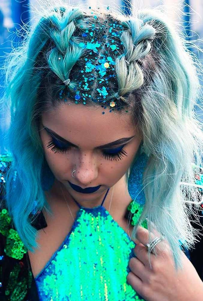 Temporary color waves and braids for a fun festival look Festival braided hairstyle with vibrant temporary color accents