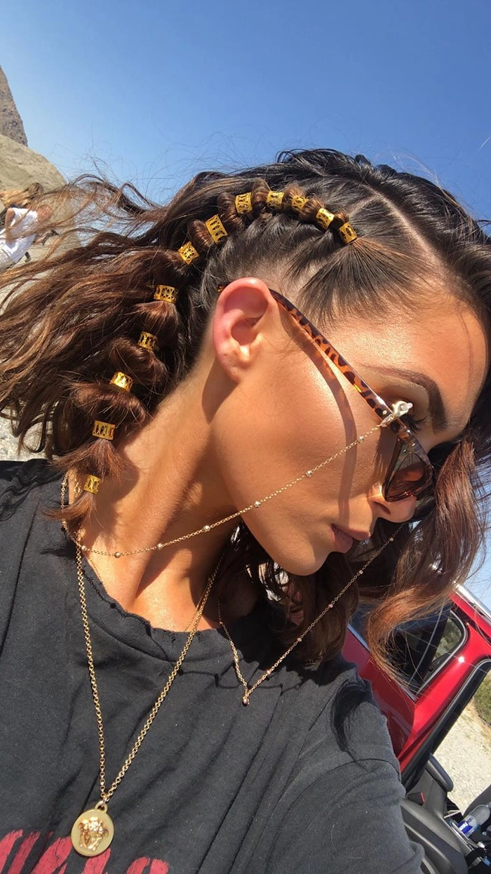 Forest Festival Hairstyle 9 - Boho Braid with Wildflowers Elegant forest festival hairstyle with floral crown and loose waves