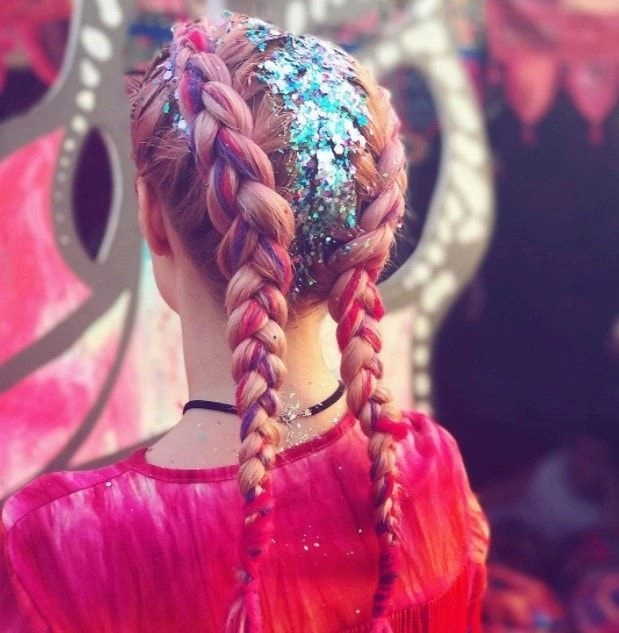 Festival hairstyle ideas for Glastonbury with braids and flowers