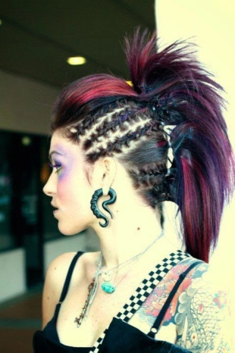 Gothic festival hairstyles with dark braids and silver accessories for a dramatic look
