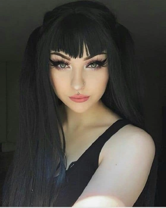 Gothic festival hairstyle with braids and dark accessories