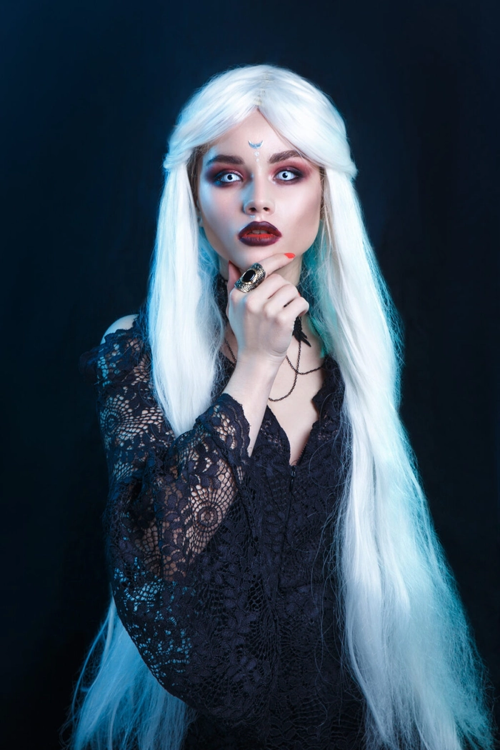 Gothic festival hairstyle with braids and dark accessories