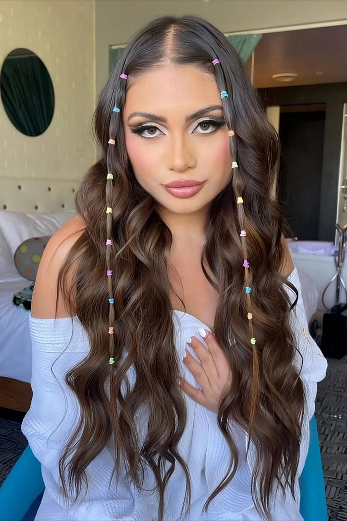 Trendy festival hairstyle for teens with braids and flowers Teen girl with festival braids and floral accessories at a music festival