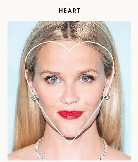 Festival Hairstyles for Heart Shaped Faces - Braided Updo with Flowers Festival hairstyles for heart shaped faces with braids and floral accents