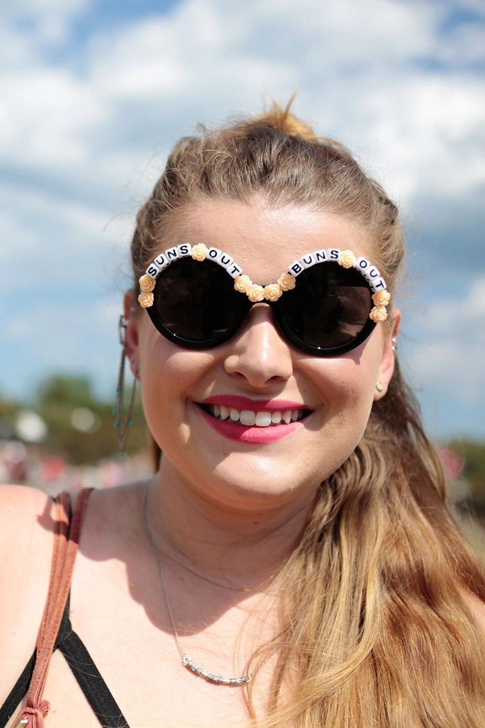 Lollapalooza festival hairstyle idea number 10 A trendy Lollapalooza hairstyle with colorful braids and festival accessories