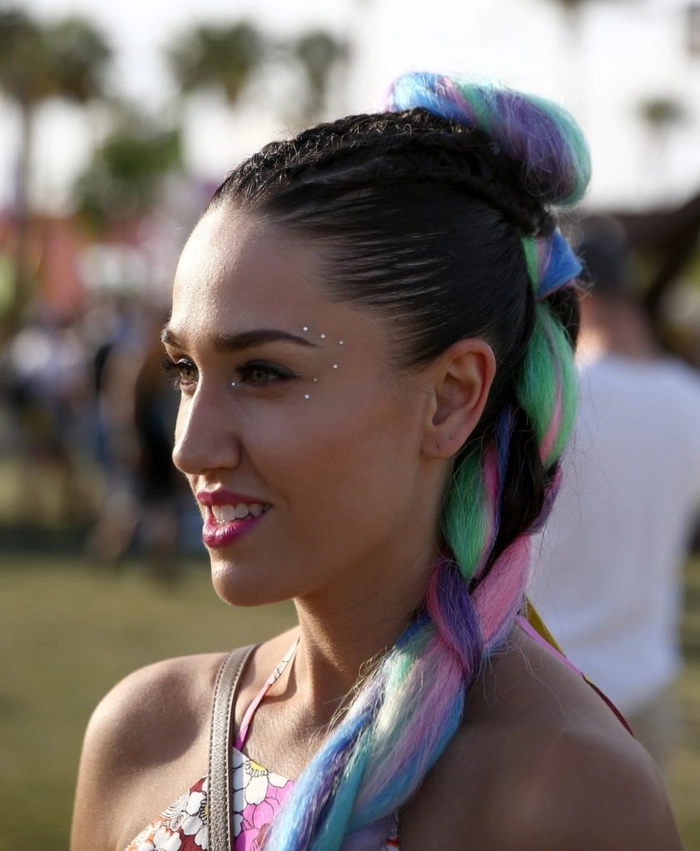 Protective festival hairstyles with vibrant braids and beads Woman wearing intricate braided protective hairstyle with beads at a festival