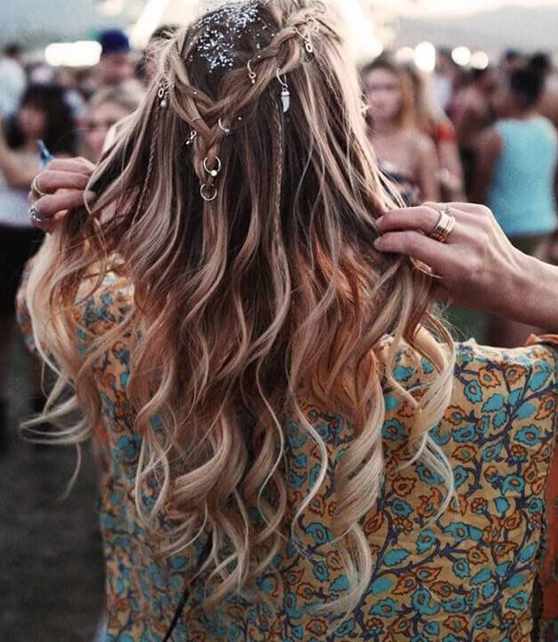 Protective Festival Hairstyles: Elegant Braided Updo with Vibrant Beads Beautiful protective braided festival hairstyle with colorful accessories and secure styling