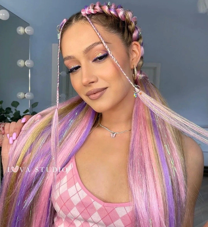 Rave Festival Hairstyle for Women - Colorful Braids with Glitter Hair Clips and Neon Highlights Vibrant rave festival hairstyle with colorful braids and glitter hair accessories for a bold party look