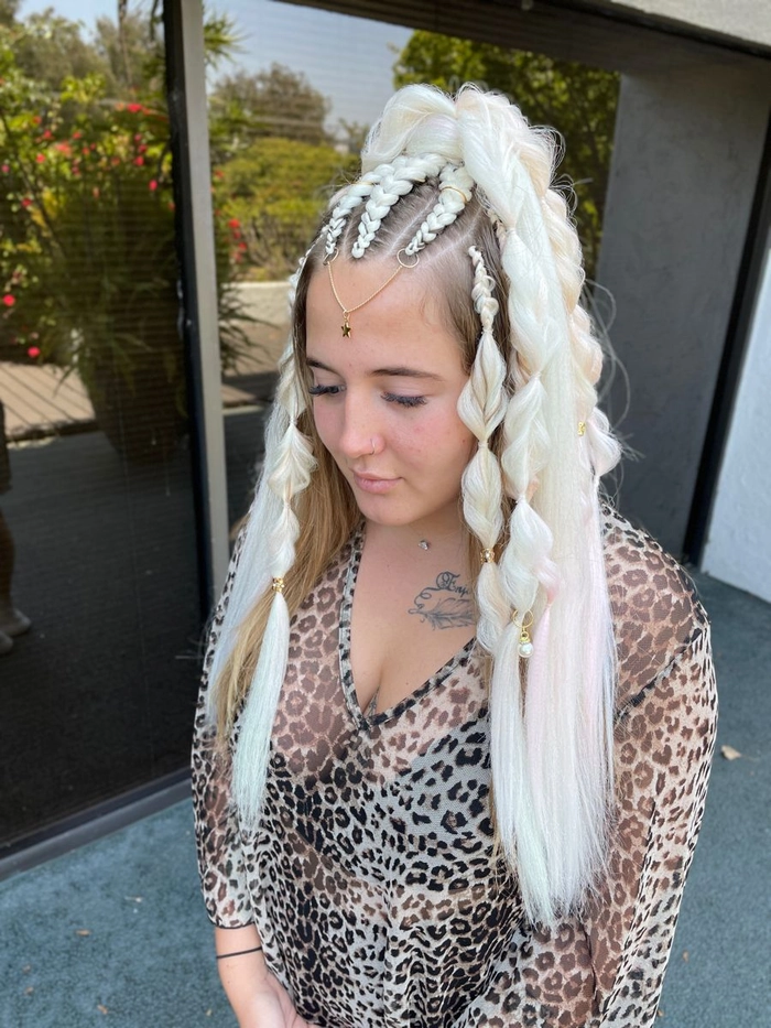 Edgy neon braided updo for rave festival hairstyles Rave festival hairstyle with colorful braids and glittery hair clips