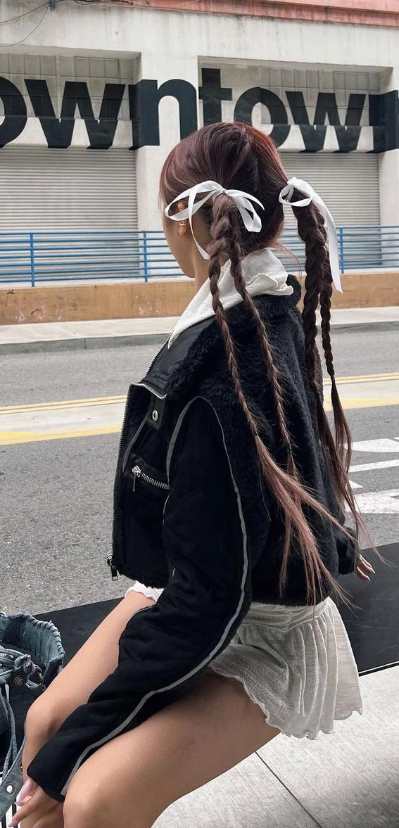 Rock festival hairstyle inspiration with messy texture and bold color accents Edgy rock festival hairstyle with braided details and bandana accessory