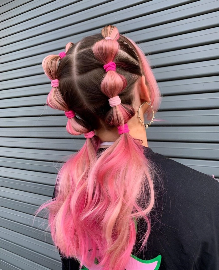 Edgy festival hairstyle with glitter accents and braids perfect for Tomorrowland Festival-ready braided updo with colorful accessories for Tomorrowland hairstyle inspiration