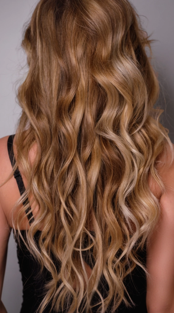 Loose beach waves for a graduation ceremony