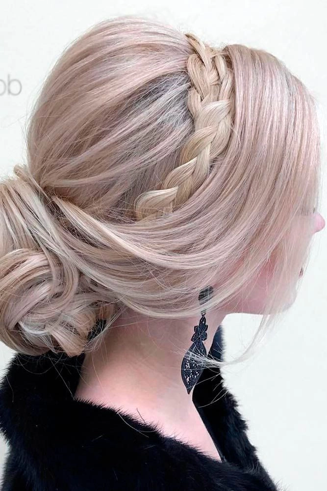 Sophisticated Braided Updo for Graduation Day Elegant braided graduation hairstyle with intricate twists and subtle highlights
