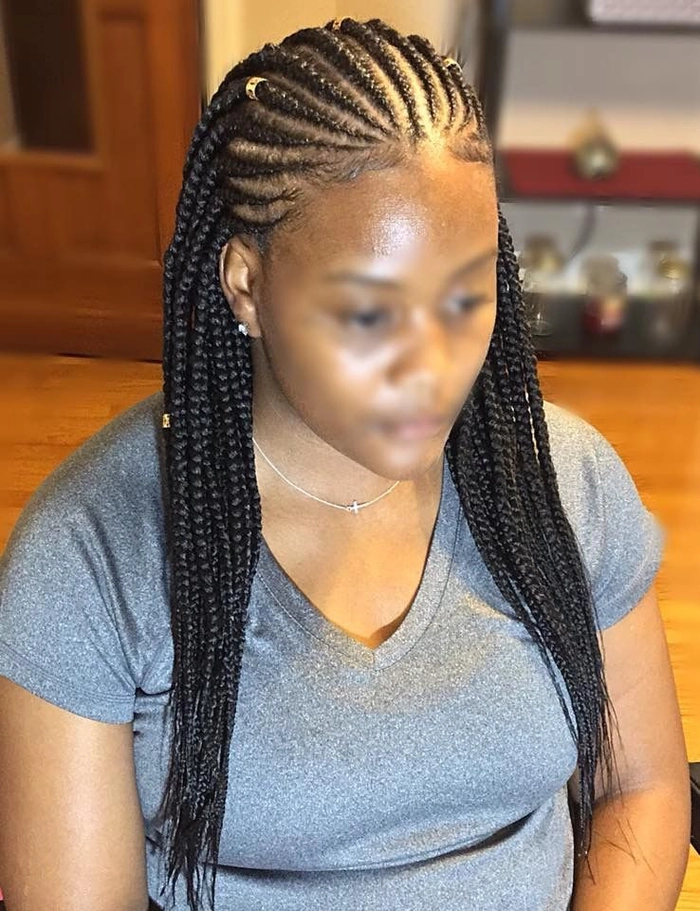 Braided Graduation Hairstyle for a Sophisticated Look Elegant braided graduation hairstyle with intricate weaving
