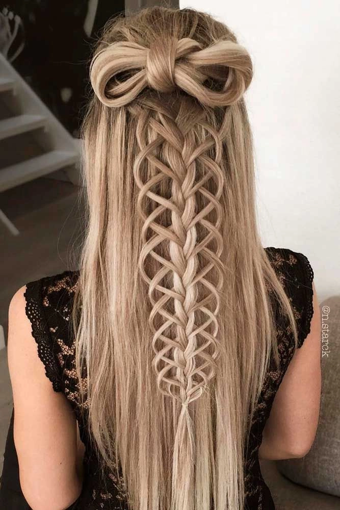 Braided Graduation Hairstyle - Step-by-Step Tutorial for a Sophisticated Look Elegant braided graduation hairstyle with delicate strands framing the face