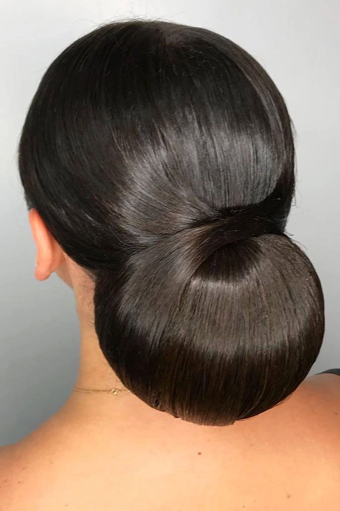 Elegant chignon bun graduation hairstyle for formal ceremonies