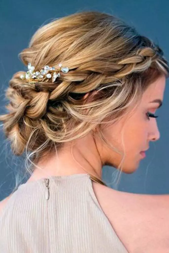 Elegant graduation updo with twisted bun and delicate pearl hairpins