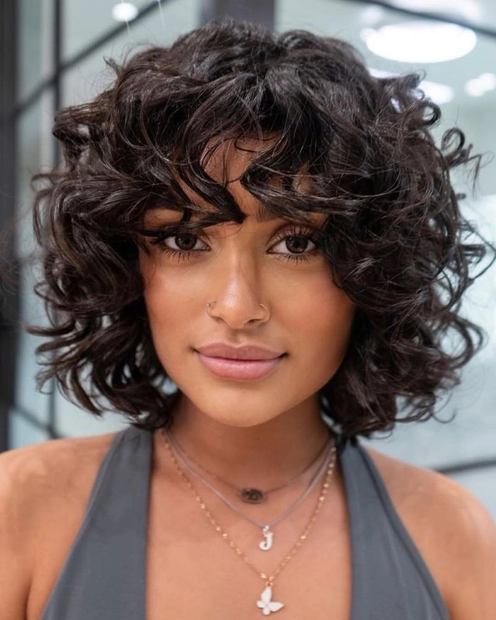 Stunning fishtail braid graduation hairstyle with soft waves