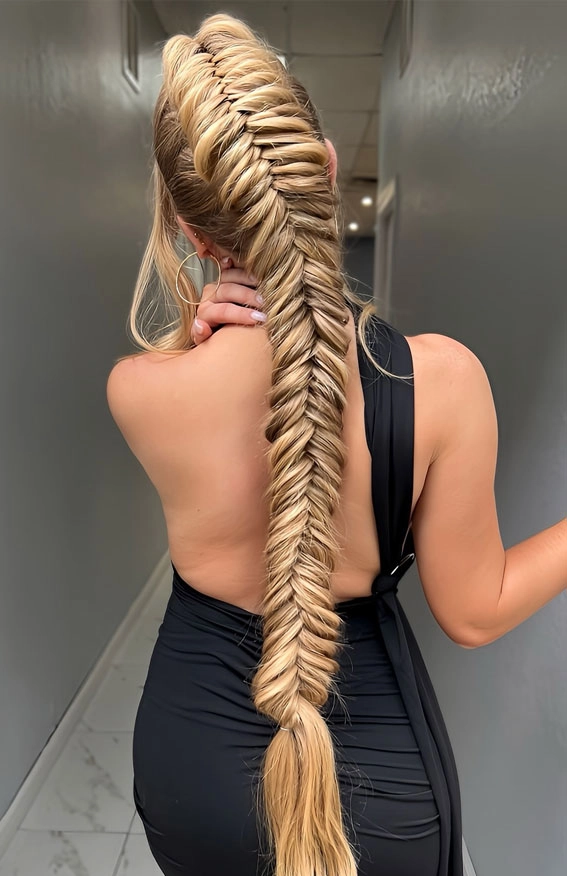 Elegant fishtail braid hairstyle for graduation day