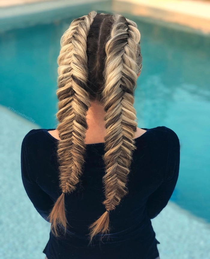 Elegant fishtail braid graduation hairstyle with delicate accessories