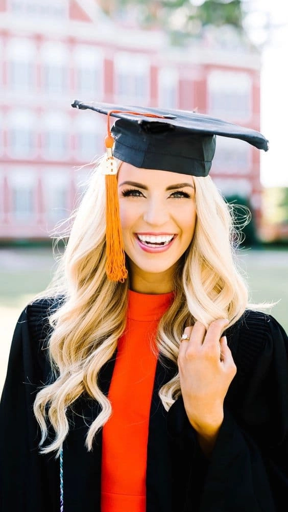 Glamorous graduation hairstyle with jeweled pins for a night ceremony An elegant updo with sparkling accessories for a glamorous graduation evening ceremony